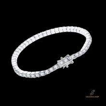Load image into Gallery viewer, A silver bracelet featuring a series of square-cut cubic zirconia stones, with a clasp type closure. Orion's Belt bracelet constellation jewellery astronomy design