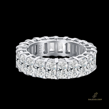 Load image into Gallery viewer, A silver ring featuring a band with multiple shining cubic zirconia stones set in a polished, silver finish. Orion constellation ring featuring two star belt astronomy jewellery